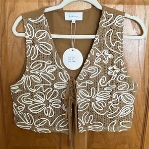 In February NWT- Embroidered Tie Front Women's Top
